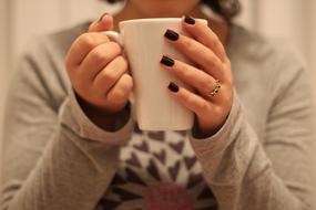 Woman holding Mug