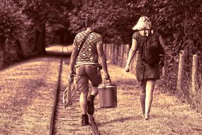 Man Woman walking park road