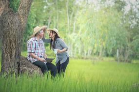 a girl near an elderly man in the park