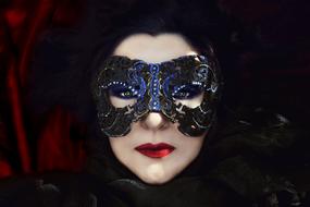 portrait of a woman in a black mask