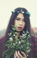Fashion portrait of Girl Female with flowers