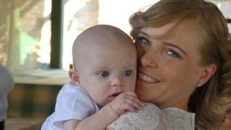 happy mother with toddler