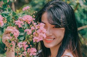 Girl and pink flowers