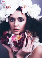 Glamour portrait, girl in floral headdress and scarf