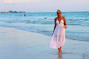 woman in white dress on the beach