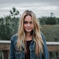 young Woman in denim jacket