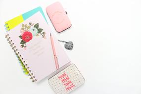 female notepad on white background
