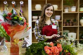 girl seller in a flower shop