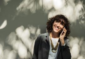 cheerful woman with smartphone