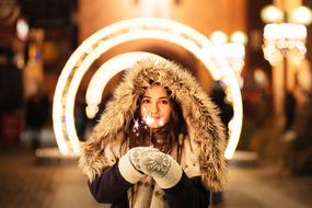 portrait of the girl at christmas lights background