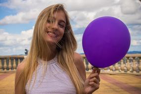 Woman with Purple Balloon