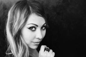 black and white picture of a charming woman