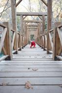 Alone Woman on wooden pier