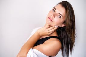 beautiful girl with makeup posing in studio