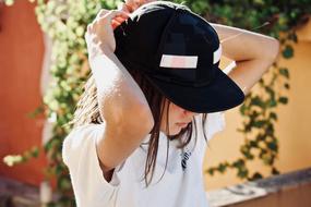 girl in black cap