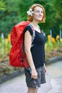 photo of a girl with a red backpack