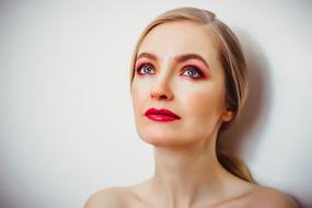 blonde Girl Portrait grey wall