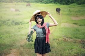 Woman hat Green grass