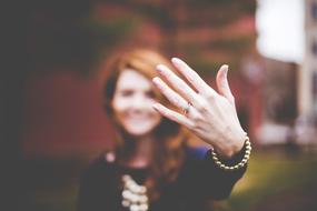 woman showing her ring