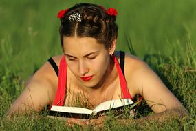 Girl Reading green grass