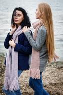 two girlfriends with long scarfs