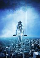 girl on a swing over the city