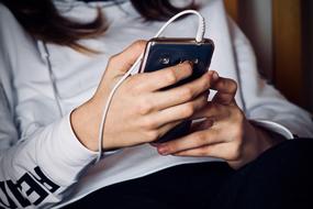 Mobile Phone in Hands of Girl