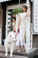Girl and white Dog