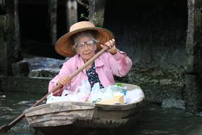 Elderly Woman Boat
