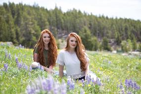 girls red hair green Grass