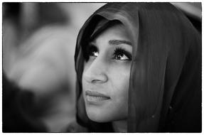 black and white portrait of a girl with a scarf on her head