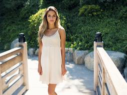 young blonde in white dress