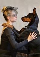 Doberman Dog and Blonde Woman