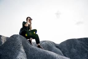 photographer with backpack and camera