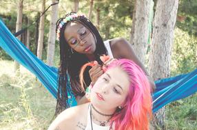girls relax in the forest