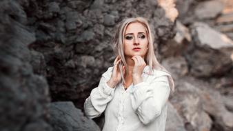Lovely Young Woman at rock