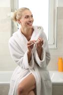 blonde in a white bathrobe