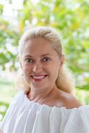 portrait of blond happy woman with blue eyes