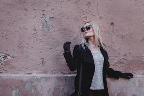 blonde woman in dark sunglasses