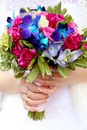 wedding colorful bouquet in hands close up