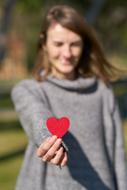 young woman with romantic symbol