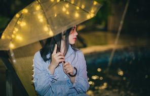 young woman with umbrella