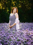 Girl and Purple violet flowers