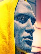 mannequin in yellow hood close up