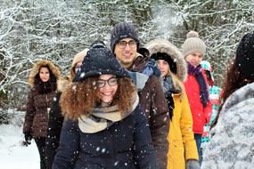 friends group in winter forest