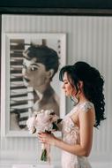 Woman in wedding dress with flowers