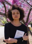 African model with book