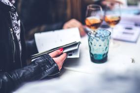 the girl with the catalog at the bar