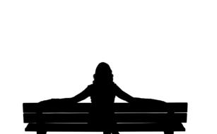 silhouette of a girl sitting on a bench