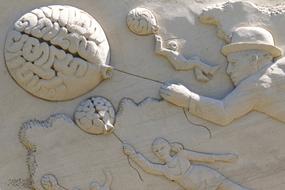 Brain Balloon Man stone wall